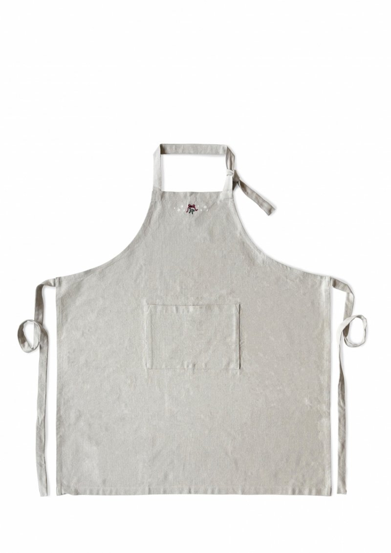 Detal haftu na piaskowym fartuchu świątecznym Christmas Fable