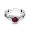 Pierścionek złoty 585 z brylantami 0,03ct granatem 0,60ct W-106