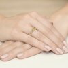 Pierścionek złoty 585 z brylantami 0,01ct oliwinem 0,60ct W-74