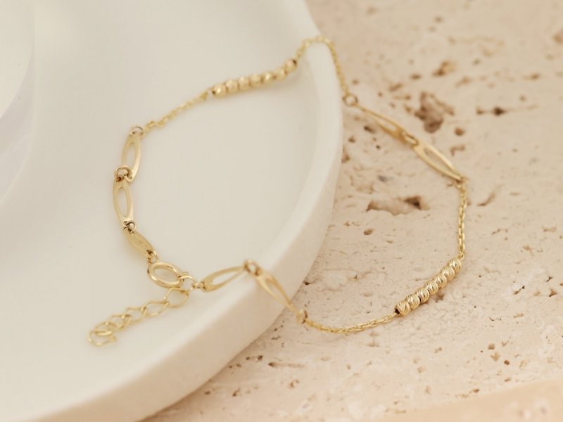 Bransoletka złota 375 delikatna kuleczki łańcuszkowa