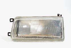 Reflektor lewy Toyota Corolla E8 1983-1987