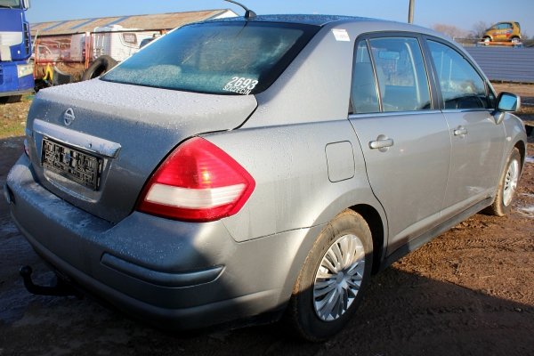 Drzwi przód prawe Nissan Tiida C11 2007 Sedan (kod lakieru: K36)