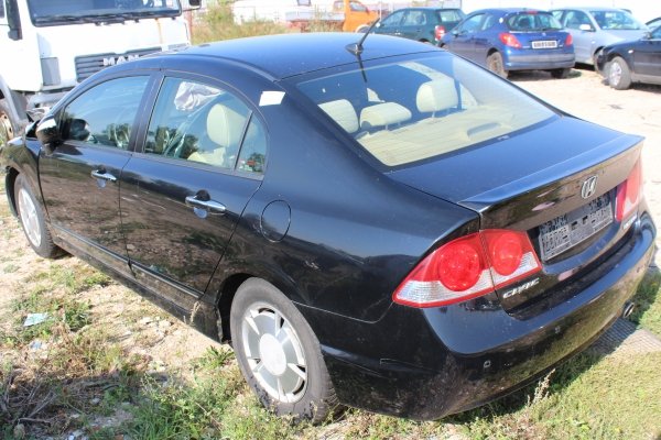 Zamek drzwi tył lewy Honda Civic Hybrid VIII FD 2007 Sedan 