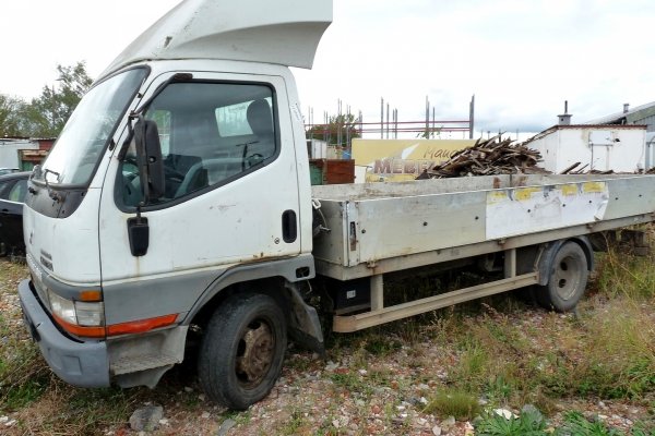 Zacisk hamulcowy przód prawy Mitsubishi Canter VI 2000 2.8TD 4M40-2AT 