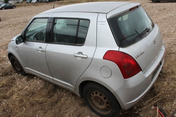 Podnośnik szyby tył lewy Suzuki Swift 2007 1.3DDiS Z13DT Hatchback 5-drzwi