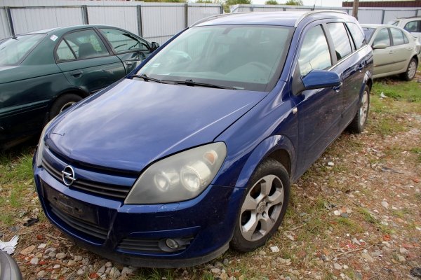 Zamek drzwi tył prawy Opel Astra H 2005 Kombi 