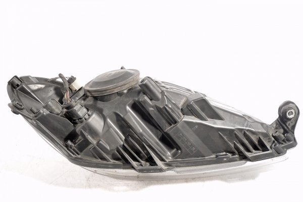 Reflektor lewy Skoda Roomster / Praktik / Fabia 2010-2015