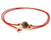GOLDENES ARMBAND MIT EDELSTAHL