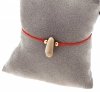 GOLDENES ARMBAND MIT EDELSTAHL