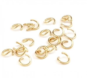 1050 Kółeczka stal chirurgiczna 200 sztuk 5x0,7mm złote otwarte 