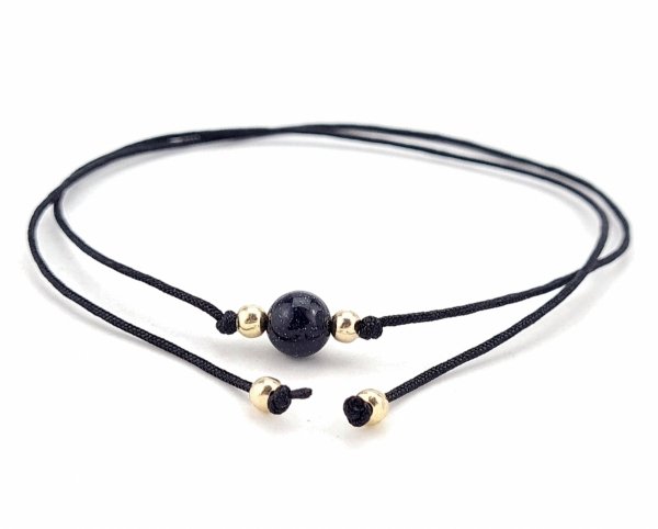 GOLDENES ARMBAND MIT EDELSTAHL