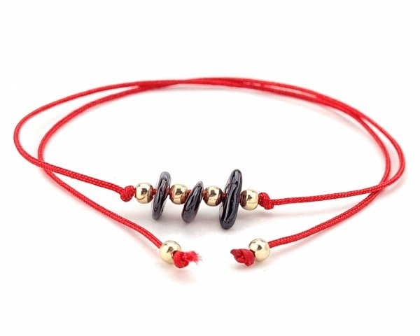 GOLDENES ARMBAND MIT EDELSTAHL