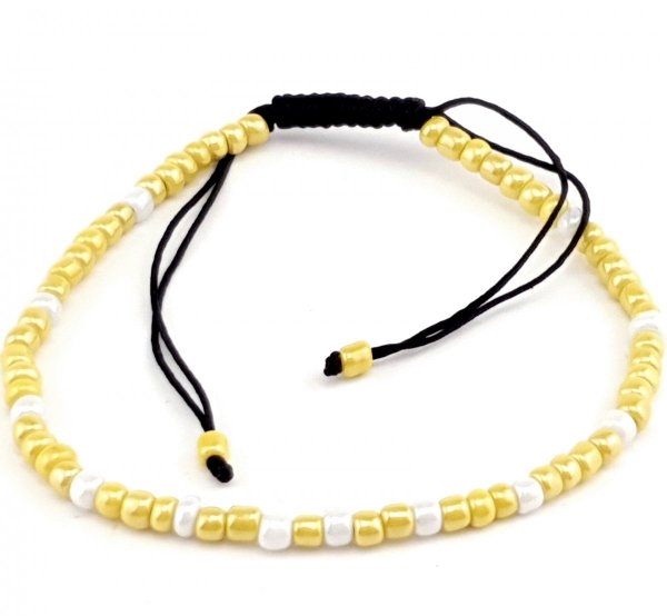 GOLDENES ARMBAND MIT EDELSTAHL