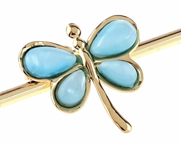 elegant gold brooch