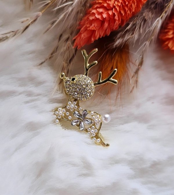 elegant gold brooch