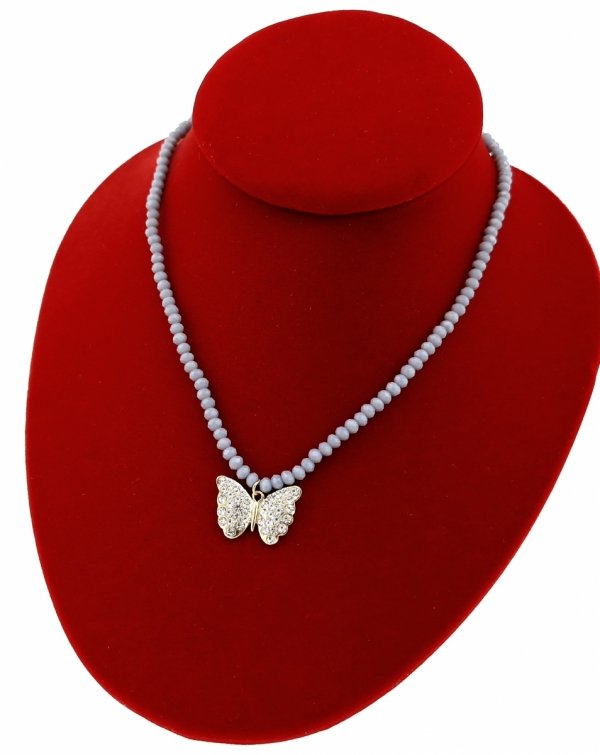 1925c Naszyjnik błyszczący szklane kryształki na gumce jubilerskiej łańcuszek motyl