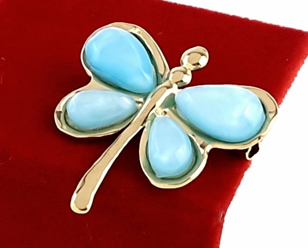 элегантная золотая брошь