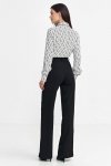 Nife Spodnie bootcut, z krytym guzikiem - czarny - SD101