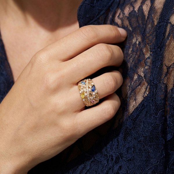 Pierścionek z motywem florystycznym i kolorowymi kamieniami złoto 585 