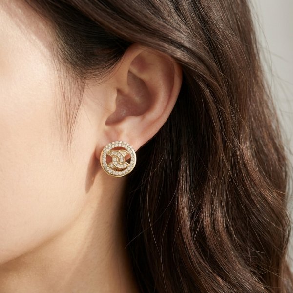 Okazałe kolczyki koła z literami złoto 585