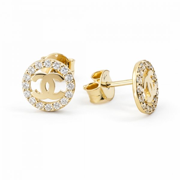 Kolczyki o splecionej formie z białymi kamieniami złoto 585