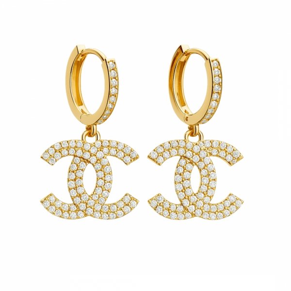 Okazałe kolczyki splecione litery złoto 585