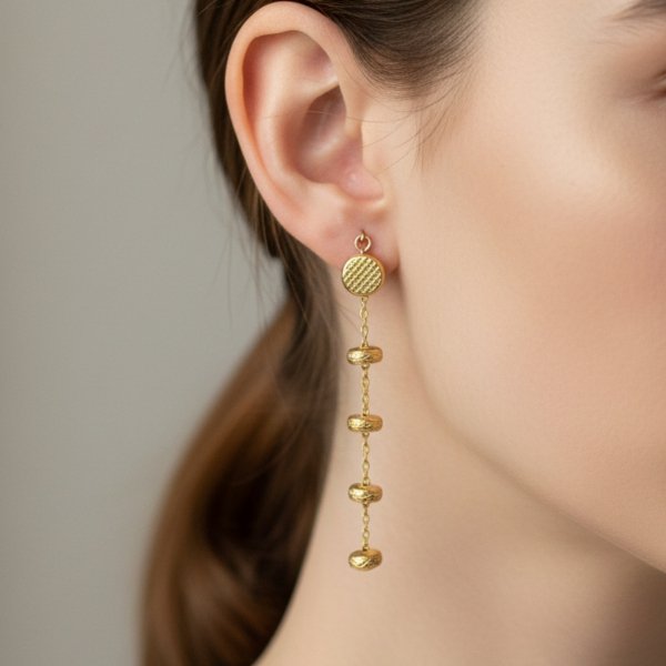 Kolczyki długie koła 3D złoto 585 