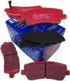 Tylne CERAMICZNE klocki RedStuff + tarcze hamulcowe 320mm EBC seria PREMIUM Ford Mustang 2015-