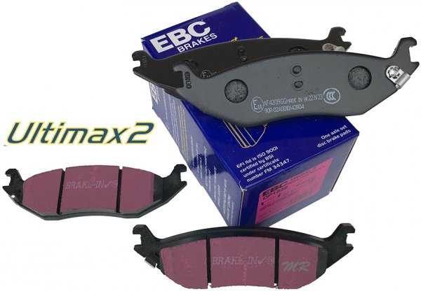 Tylne klocki Ultimax2 + nawiercone nacinane tarcze hamulcowe EBC seria GD Dodge RAM 1500 2003-