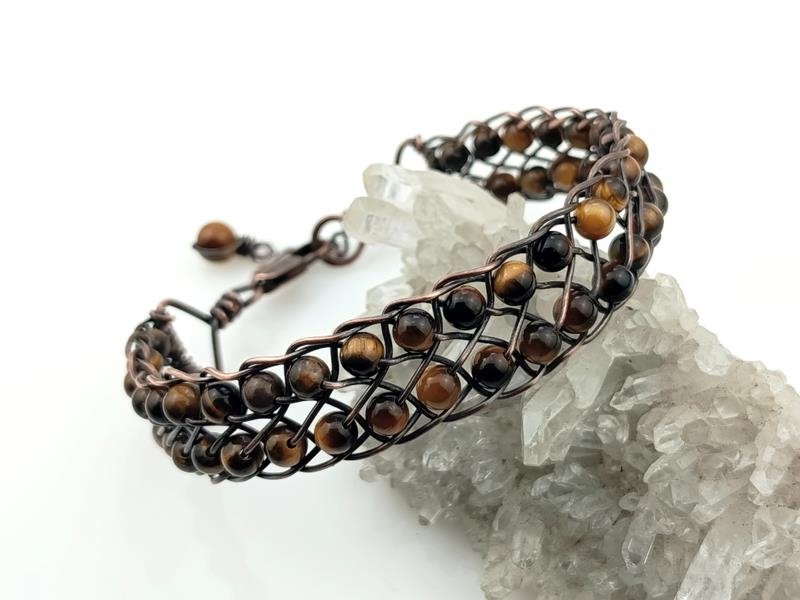 Bransoletka miedziana z tygrysim okiem, splot Kumihimo, obwód 18.5 cm plus 2 cm, waga 17 gram, rękodzieło