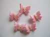 Motylki cukrowe na tort małe różowe 3D 100szt