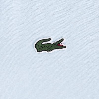 Bluza męska Lacoste błękitna bawełniana rozpinana z kołnierzykiem kieszenie zapinane na zamek