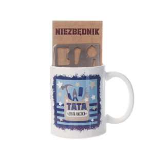 Kubek ceramiczny z napisem NIEZBĘDNIK TATY z narzędziem wielofunkcyjnym.